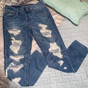 American Eagle Tomgirl medium wash distressed button fly jeans size 0 regular
